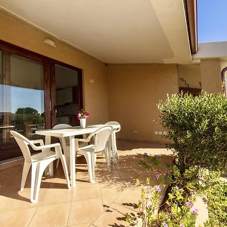 Aparthotel Isa-village In Porto Corallo Just 200 Meters From The Sea, With Private Outdoor Area